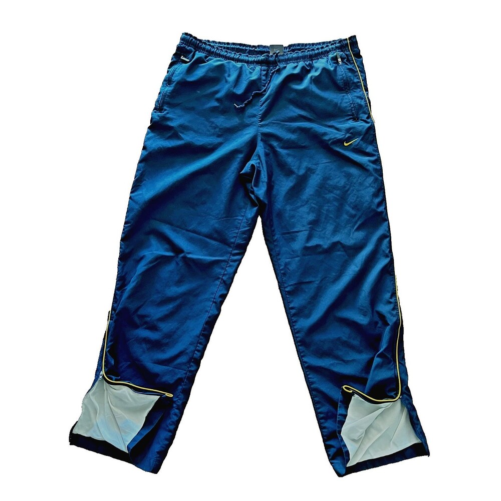 Vtg NIKE Track Pants Lined Mens M Blue Yellow Swoosh Ankle Zip Pocket Athleisure